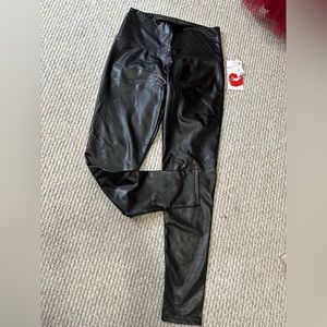 Brand New black leather leggins. Size M